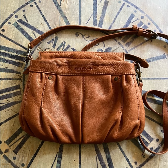 American Leather Co. Handbags - American Tan Leatherette Pleated Crossbody Bag